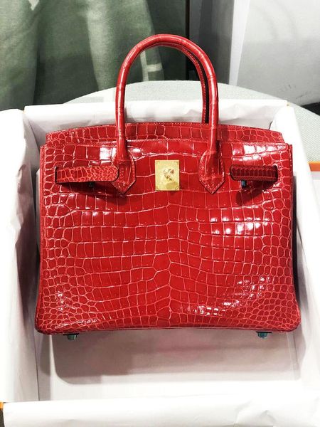 duffel bags foreign trade high-end handbag high-gloss crocodile lady high-capacity
duffel bags foreign trade high-end handbag high-gloss crocodile lady high-capacity