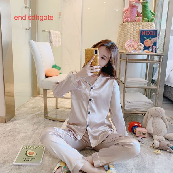 solid ice and silk pajamas autumn women's spring color long sleeve cardigan two piece household clothes women, Black;white
solid ice and silk pajamas autumn women's spring color long sleeve cardigan two piece household clothes women, Black;white