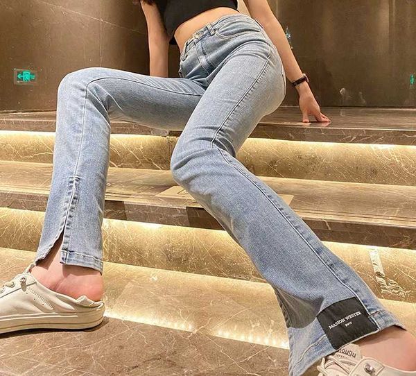 spring 2021 urban leisure slim straight pants light blue trousers washed high waist split jeans
spring 2021 urban leisure slim straight pants light blue trousers washed high waist split jeans