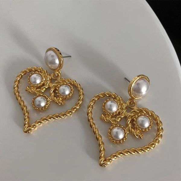 european and american baroque retro exaggerated hollowed out pearl temperament love earrings girl, Silver
european and american baroque retro exaggerated hollowed out pearl temperament love earrings girl, Silver