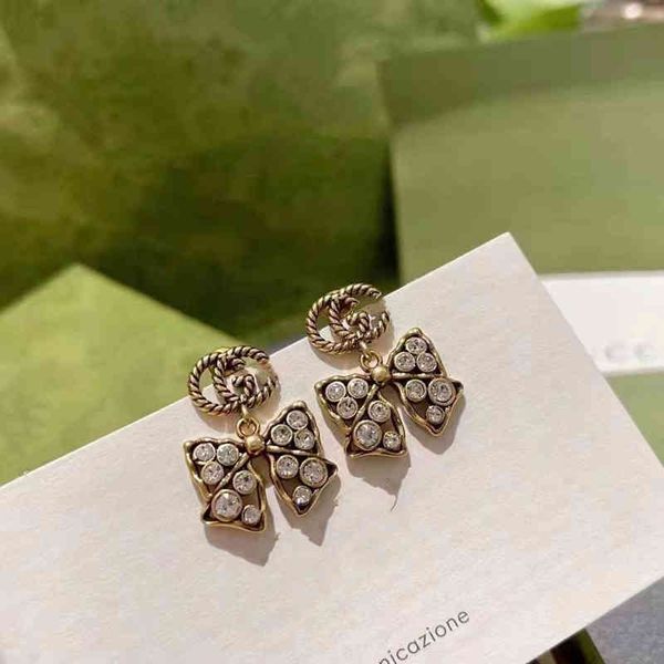 70% off s925 silver needle brass old minority personality bow, full diamond earrings, family 21 new earrings, Golden
70% off s925 silver needle brass old minority personality bow, full diamond earrings, family 21 new earrings, Golden