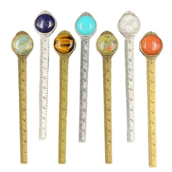 bookmark antique brass tiger eyes inlaid faux gems ruler for book marking 
bookmark antique brass tiger eyes inlaid faux gems ruler for book marking