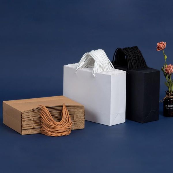 gift wrap custom logo10pcs/lot large size white handle kraft paper packaging bags books gifts clothes 
gift wrap custom logo10pcs/lot large size white handle kraft paper packaging bags books gifts clothes