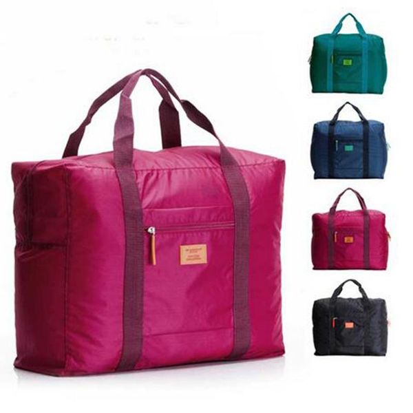 storage bags super large capacity foldable luggage clothing bag for travel camping waterproof nylon handle portable folding handbags 
storage bags super large capacity foldable luggage clothing bag for travel camping waterproof nylon handle portable folding handbags