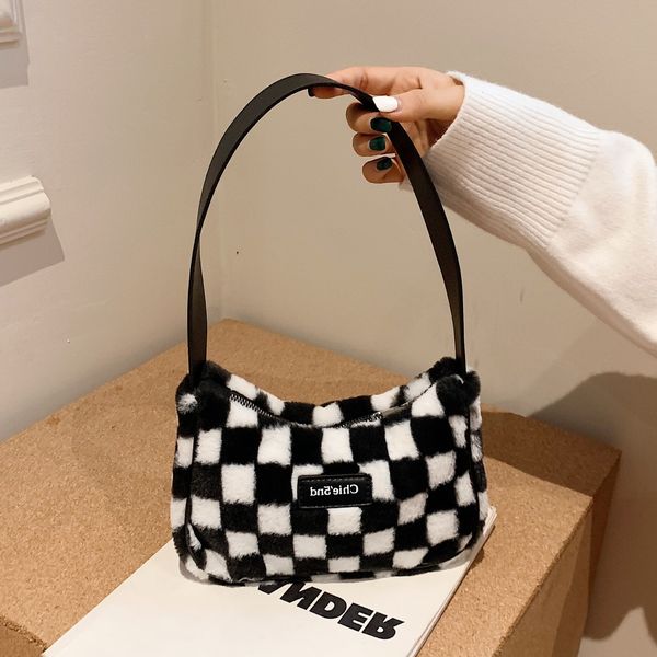 2021 autumn winter fashion versatile black and white check this year's popular one shoulder portable women's bag street trend clas
2021 autumn winter fashion versatile black and white check this year's popular one shoulder portable women's bag street trend clas