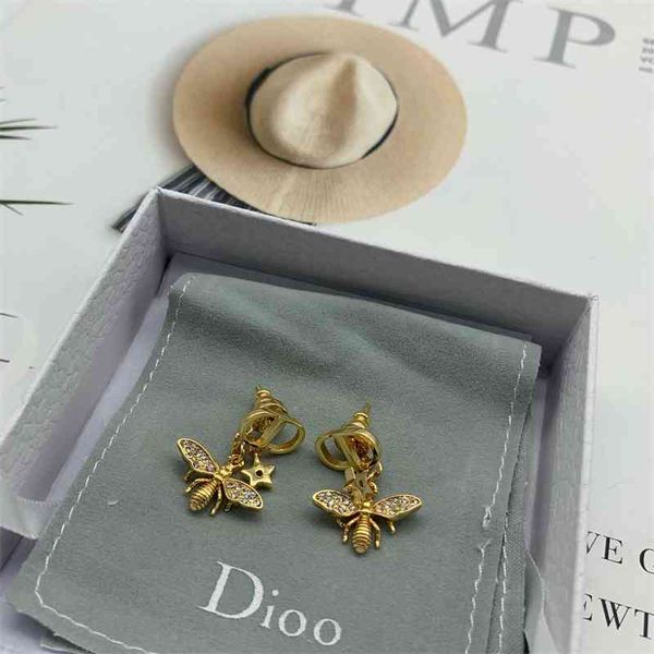 70% off outlet online bee asymmetric star earrings for women, Golden 
70% off outlet online bee asymmetric star earrings for women, Golden