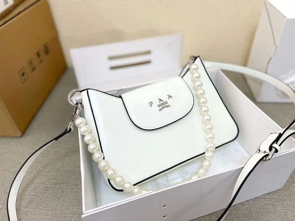 2021 handbag white buckle zipper fashion pearl shoulder bags strap high-end style versatile casual small and cute
2021 handbag white buckle zipper fashion pearl shoulder bags strap high-end style versatile casual small and cute
