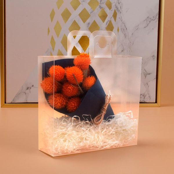 gift wrap transparent plastic tote bag candy cosmetics high-end small packaging box shopping shoulder handbag
gift wrap transparent plastic tote bag candy cosmetics high-end small packaging box shopping shoulder handbag