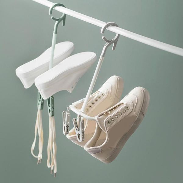 rotating double hooks windproof anti-skid household shoe drying rack hanger 
rotating double hooks windproof anti-skid household shoe drying rack hanger