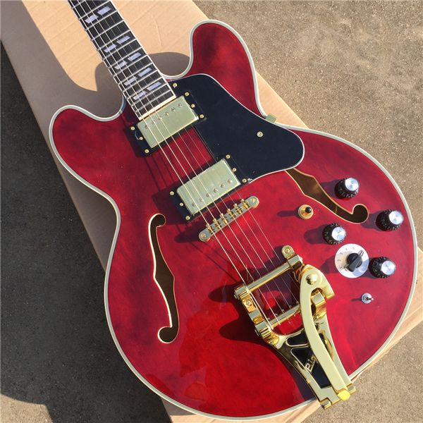 customized 335 transparent red semi-hollow jazz electric guitar tremolo system golden rosewood fingerboard
customized 335 transparent red semi-hollow jazz electric guitar tremolo system golden rosewood fingerboard