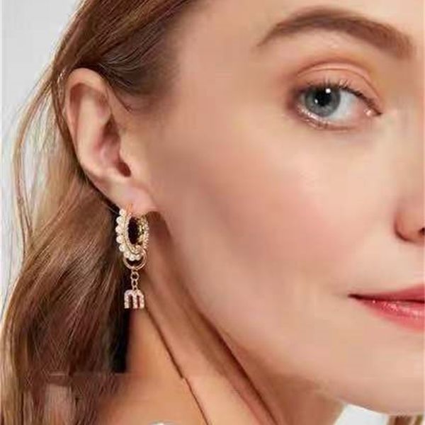 letter m pendant asymmetric earrings round detachable pearl two-color diamond circle earrings, Golden
letter m pendant asymmetric earrings round detachable pearl two-color diamond circle earrings, Golden