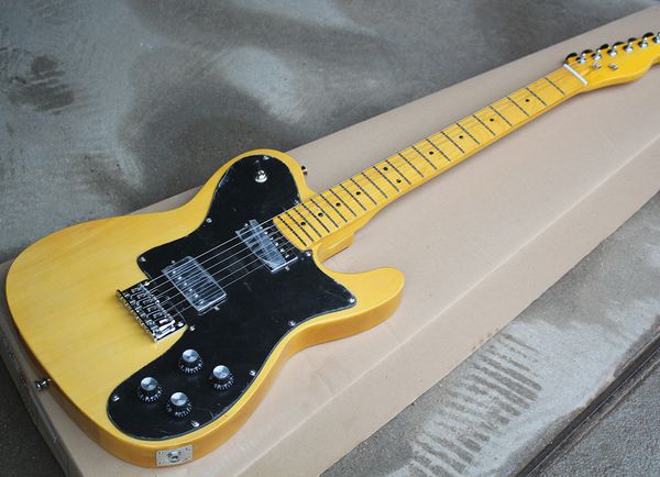 tl electric guitar with dual pickups retro yellow body and neck with large black guard
tl electric guitar with dual pickups retro yellow body and neck with large black guard