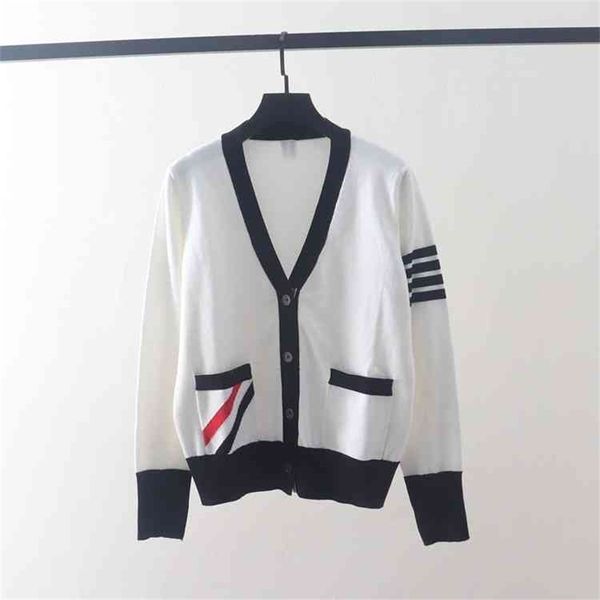 autumn and winter new tb color slash knitted women's cardigan v-neck matching loose thin sweater coat, White
autumn and winter new tb color slash knitted women's cardigan v-neck matching loose thin sweater coat, White
