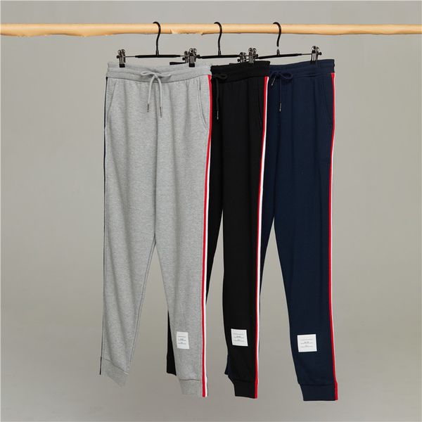 tb side ribbon trendy casual sports net red pants men's and women's leggings, White;black
tb side ribbon trendy casual sports net red pants men's and women's leggings, White;black