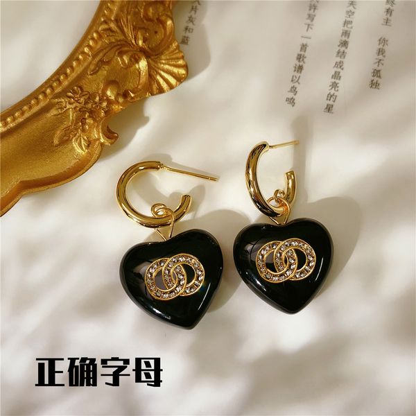 european screw back american personality cool girl black peach heart gold hook earrings female 925 silver needle small fragrance ear jewelry
european screw back american personality cool girl black peach heart gold hook earrings female 925 silver needle small fragrance ear jewelry