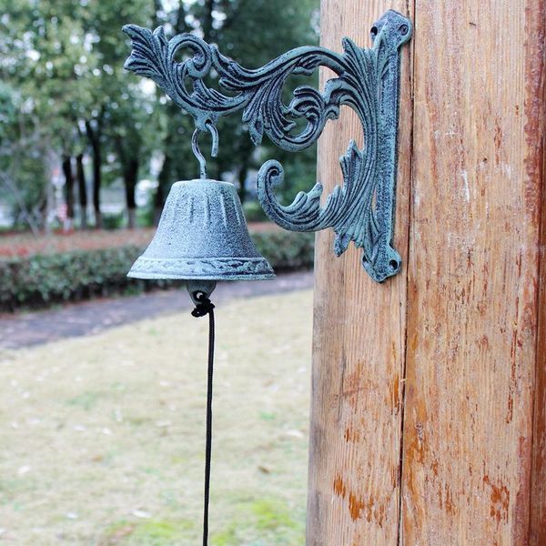 large american european style antique cast iron doorbell bell in front of the door courtyard decoration
large american european style antique cast iron doorbell bell in front of the door courtyard decoration