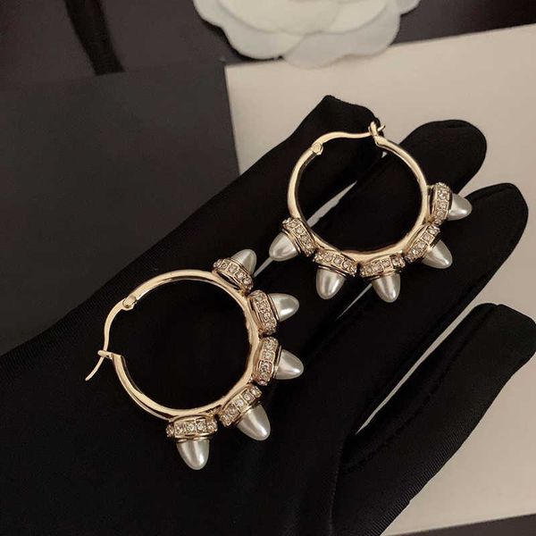 2021 new brand fashion pearl jewelry gold color steam punk rivet earrings pearl tassel pearls design wedding party earrings, Golden
2021 new brand fashion pearl jewelry gold color steam punk rivet earrings pearl tassel pearls design wedding party earrings, Golden