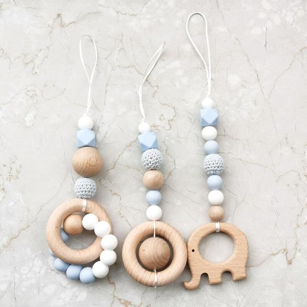 natural wooden teething toy interchangeable pacifier holder strap beaded clip neutral baby the gift for kids
natural wooden teething toy interchangeable pacifier holder strap beaded clip neutral baby the gift for kids