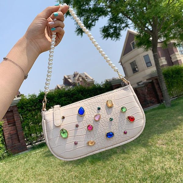shoulder bags crocodile pattern pearl tote bag 2021 fashion high-quality leather women's designer handbag diamond messenger
shoulder bags crocodile pattern pearl tote bag 2021 fashion high-quality leather women's designer handbag diamond messenger