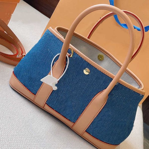 2022denim jeans shopping bag lady tote shoulder bags woman handbag purse canvas classic letter old flower printed golden hardwar
2022denim jeans shopping bag lady tote shoulder bags woman handbag purse canvas classic letter old flower printed golden hardwar