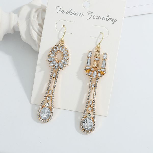 style exaggerated metal inlaid diamond spoon fork creative design fashionable accessories earrings, Silver
style exaggerated metal inlaid diamond spoon fork creative design fashionable accessories earrings, Silver