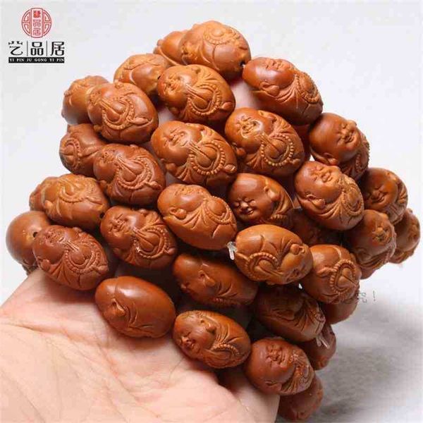 the stone carving wholeheartedly meditates buddha's red skin old oil core, and little sami plays with the olive core
the stone carving wholeheartedly meditates buddha's red skin old oil core, and little sami plays with the olive core