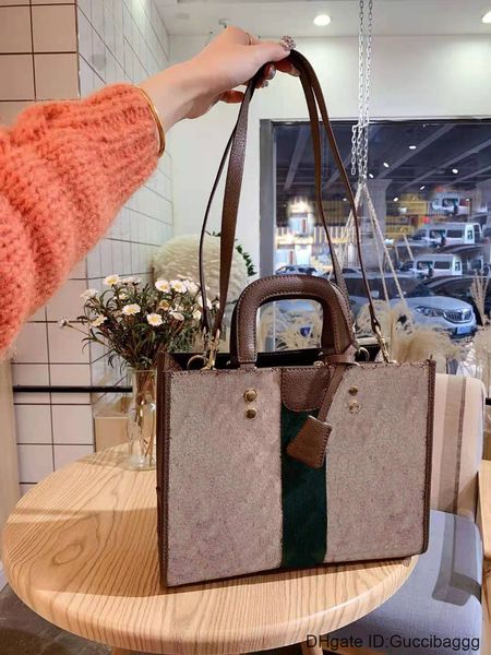 2021 the new fashion bags ladies purses handbags large wide stripe shopping one shoulder both print women totes handbag
2021 the new fashion bags ladies purses handbags large wide stripe shopping one shoulder both print women totes handbag