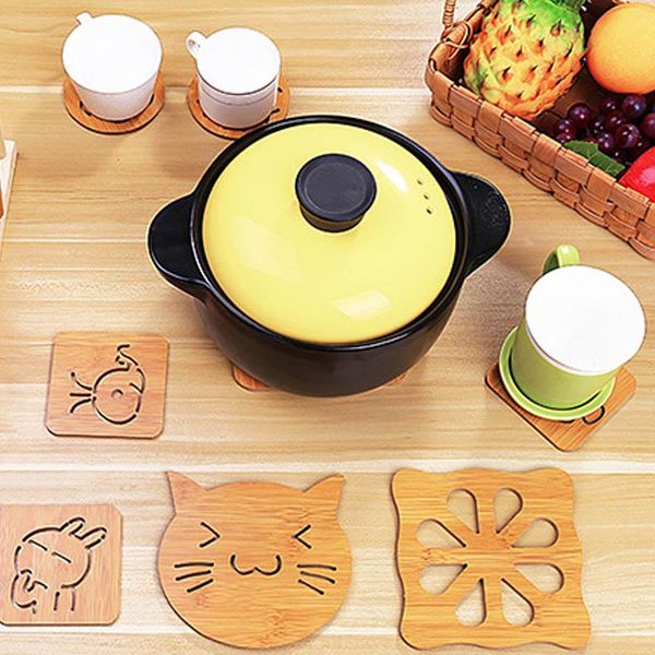 mats & pads hollow out wood isolation pad bowl cup cartoon pattern pot mat 1 pc kitchen gadgets heat resistant
mats & pads hollow out wood isolation pad bowl cup cartoon pattern pot mat 1 pc kitchen gadgets heat resistant