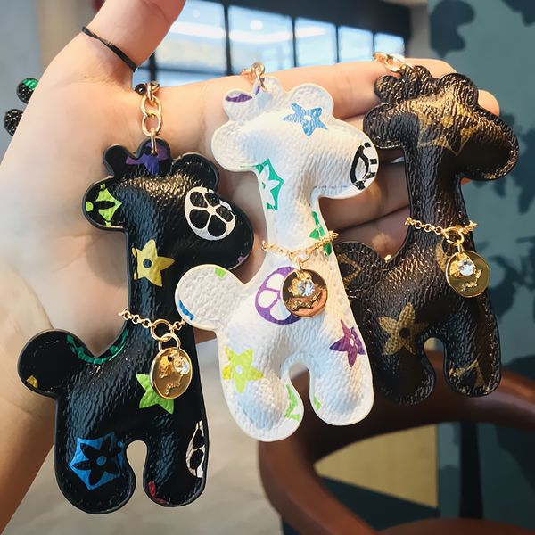 2021 fashion keychain creative high-end leather pu giraffe key chain men and women lovers cute fawn car pendant gift, Silver
2021 fashion keychain creative high-end leather pu giraffe key chain men and women lovers cute fawn car pendant gift, Silver