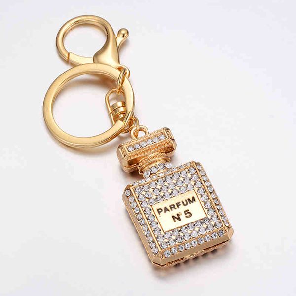 trendy key aesthetic perfume bottle with rhinestones chain alloy chain accessories pendant ring charms keychains for women men, Slivery;golden
trendy key aesthetic perfume bottle with rhinestones chain alloy chain accessories pendant ring charms keychains for women men, Slivery;golden