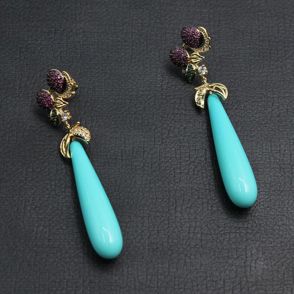 guaiguai jewelry teardrop turquoise blue sea shell pearl yellow gold color plated cz paved flower stud earrings for women, Silver
guaiguai jewelry teardrop turquoise blue sea shell pearl yellow gold color plated cz paved flower stud earrings for women, Silver
