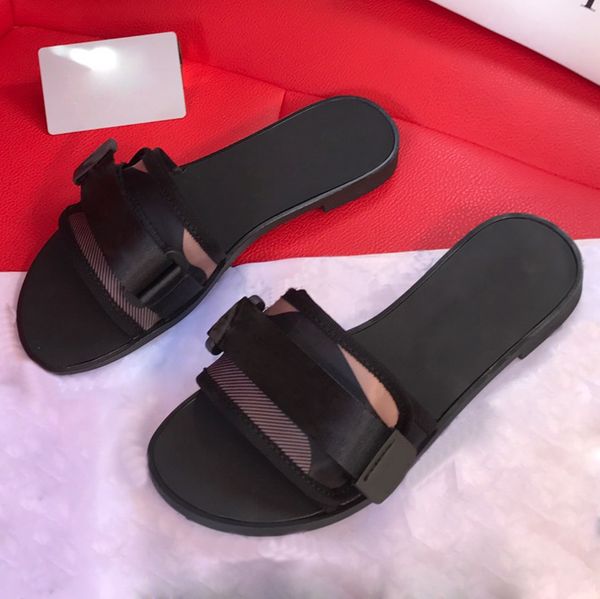 designer ladies slippers essential summer wardrobe piece nylon adjustable strap covering same color shiny technical fabric band rubber sole, Black
designer ladies slippers essential summer wardrobe piece nylon adjustable strap covering same color shiny technical fabric band rubber sole, Black