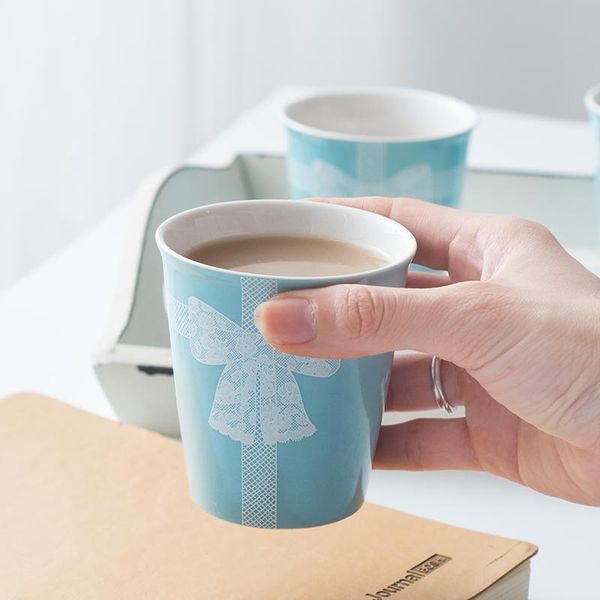 mugs blue white lace bowknot mug ceramic paper cup without handle quality coffee cups pen holder shape tumblers freind gift
mugs blue white lace bowknot mug ceramic paper cup without handle quality coffee cups pen holder shape tumblers freind gift