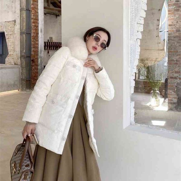 2021 winter new small fragrance medium long down jacket temperament black and white heavy industry pearl buckle 
2021 winter new small fragrance medium long down jacket temperament black and white heavy industry pearl buckle