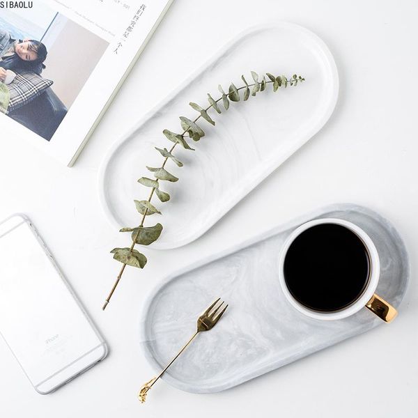white marble ceramics storage tray oval ellipse fruit tray decorative plate jewelry dessert storage dish decoration
white marble ceramics storage tray oval ellipse fruit tray decorative plate jewelry dessert storage dish decoration