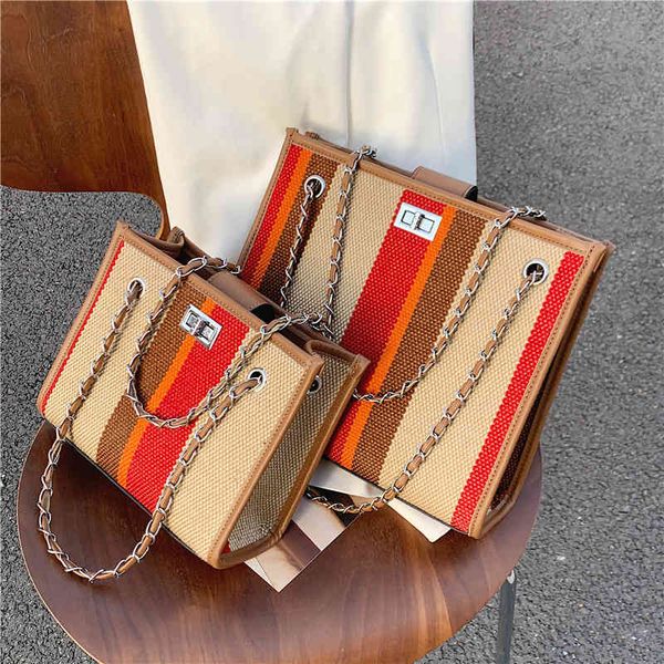 luxury handbags female new canvas stripe messenger bag popular size lock chain single shoulder tote bag
luxury handbags female new canvas stripe messenger bag popular size lock chain single shoulder tote bag