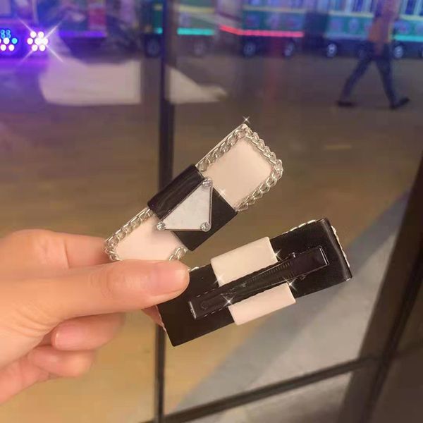 luxury women letter hair clip with stamp triangle letters barrettes black white famous hair accessories p064, Golden;silver
luxury women letter hair clip with stamp triangle letters barrettes black white famous hair accessories p064, Golden;silver
