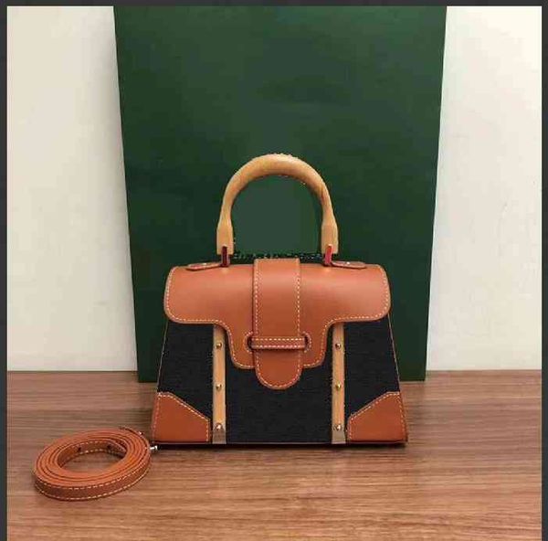designer bags goya mini saigon bag wooden handle handbag one shoulder messenger female handbags cowhide wallet 2021
designer bags goya mini saigon bag wooden handle handbag one shoulder messenger female handbags cowhide wallet 2021