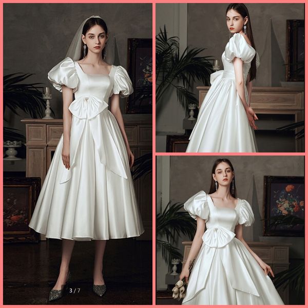 2021 attractive wholesale white satin short wedding dresses vintage cap sleeve petite girls informal bride gowns tea length with bow modest
2021 attractive wholesale white satin short wedding dresses vintage cap sleeve petite girls informal bride gowns tea length with bow modest