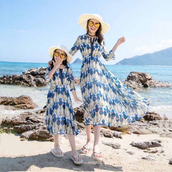 children a family of three parents wear and beach skirt for holiday, Blue 
children a family of three parents wear and beach skirt for holiday, Blue