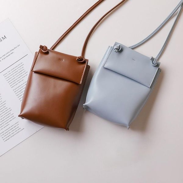 storage bags 2021 retro vertical mobile phone bag fashion simple mini straddle small single shoulder soft face satchel
storage bags 2021 retro vertical mobile phone bag fashion simple mini straddle small single shoulder soft face satchel