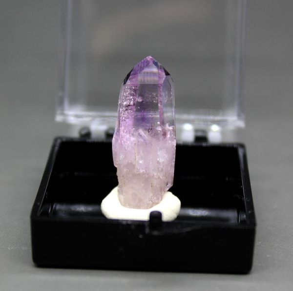 100% natural rare cruz amethyst mineral specimen single crystal stone and crystal quartz cluster box size 3.4 cm 
100% natural rare cruz amethyst mineral specimen single crystal stone and crystal quartz cluster box size 3.4 cm