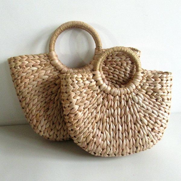 straw bag simplicity solid color woven bag classical hand vacation beach 
straw bag simplicity solid color woven bag classical hand vacation beach