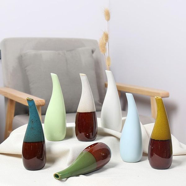 vases modern simple transmutation ceramic vase for living room decorative household bedroom table mini flower
vases modern simple transmutation ceramic vase for living room decorative household bedroom table mini flower
