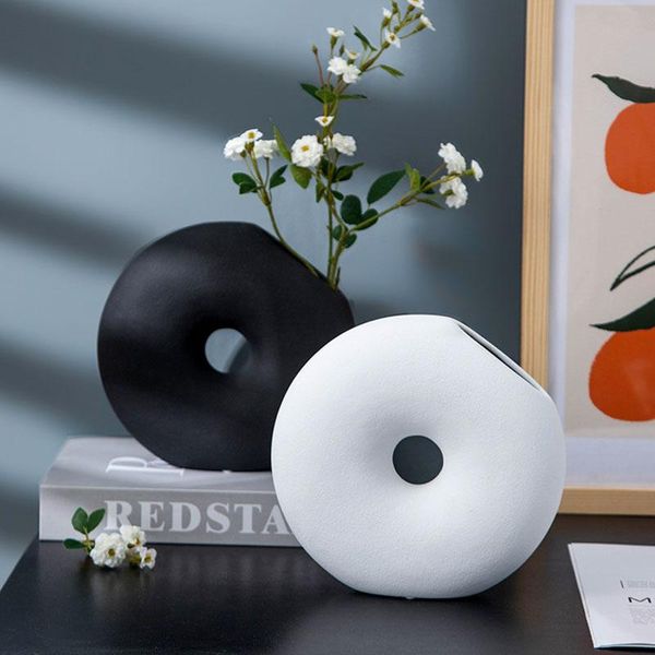 nordic contracted white donut ceramic vase hydroponic device flower vase deskcrafts european home decoration wedding gifts
nordic contracted white donut ceramic vase hydroponic device flower vase deskcrafts european home decoration wedding gifts