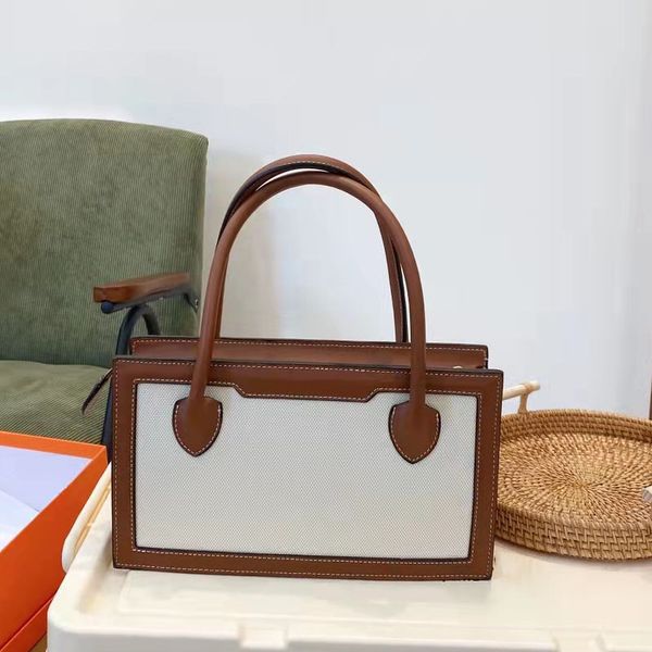 2022 owhide messenger tote large capacity handbag plain letter thread canvas genuine leather zipper hard solid bag women designer handbags m
2022 owhide messenger tote large capacity handbag plain letter thread canvas genuine leather zipper hard solid bag women designer handbags m