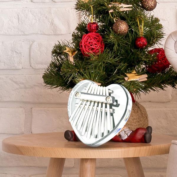 party favor mini kalimba 8 keys crystal thumb piano finger harp musical instruments for beginner high-quality instrument
party favor mini kalimba 8 keys crystal thumb piano finger harp musical instruments for beginner high-quality instrument
