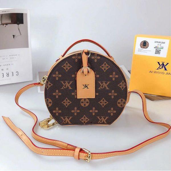 artificial leather bags for women 2021 new retro pattern fashion small round bag portable travel bag
artificial leather bags for women 2021 new retro pattern fashion small round bag portable travel bag