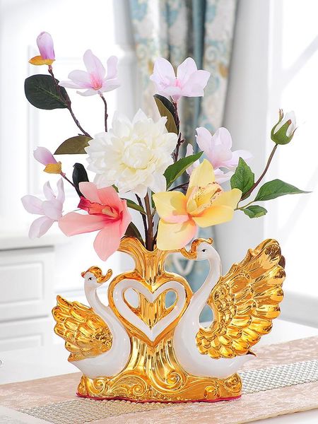 gold-plated swan wedding gift ceramic vase ornaments home furnishing decoration crafts livingroom creative tv cabinet figurines
gold-plated swan wedding gift ceramic vase ornaments home furnishing decoration crafts livingroom creative tv cabinet figurines