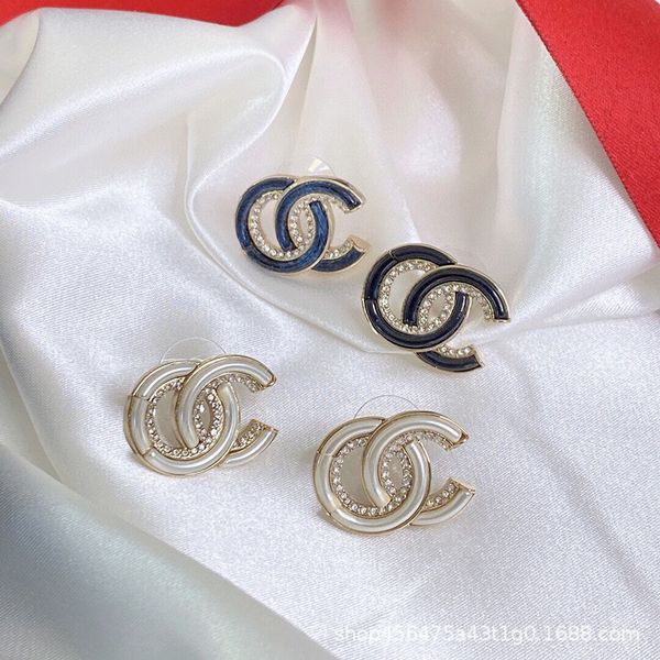 21 new fashion small fragrance letter temperament cold wind geometric square black and white earrings female s925 silver needle, Golden
21 new fashion small fragrance letter temperament cold wind geometric square black and white earrings female s925 silver needle, Golden